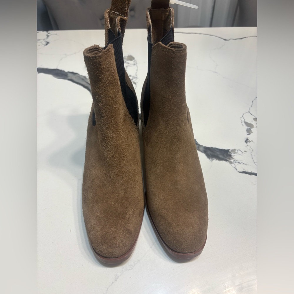 Steve Madden suede ankle boots are stylish and versatile footwear, never worn.